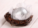 Wooden ball in nest, 10-12cm, silver