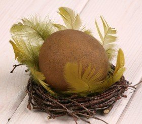 Wooden ball in nest, 10-12 cm, olive green